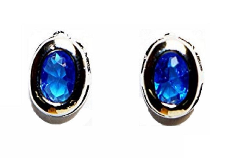 Buyless Fashion Surgical Steel Rhodium Plated Oval Cubic Zirconia Birthstone Earrings